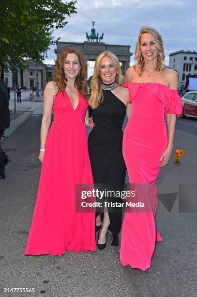 Jule Goelsdorf, Angela van Brakel and Christine Langner attend the Bundespresseball at Hotel Adlon Kempinski on April 12, 2024 in Berlin, Germany.