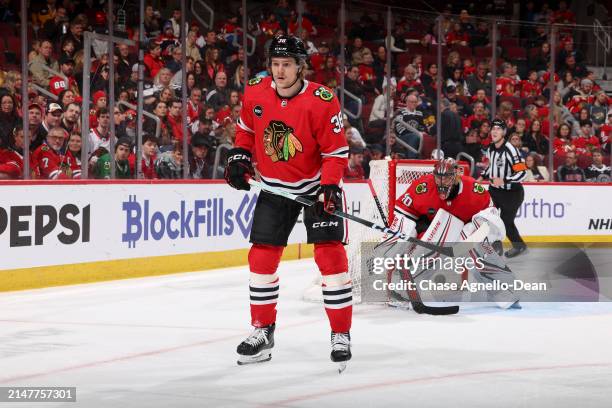 Ethan Del Mastro of the Chicago Blackhawks watches for the puck in the first period against the Nashville Predators at the United Center on April 12,...