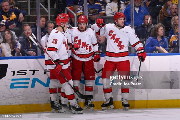 Seth Jarvis of the Carolina Hurricanes is congratulated after scoring a goal against the St. Louis Blues on April 12, 2024 at the Enterprise Center...