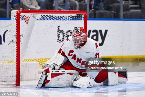 April 12: Carolina Hurricanes goaltender Frederik Andersen stretches out before the start of the second period during a regular season game between...