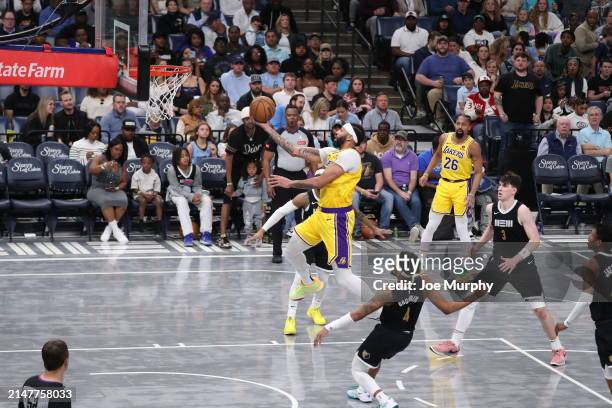 Anthony Davis of the Los Angeles Lakers drives to the basket during the game against the Memphis Grizzlies on April 12, 2024 at FedExForum in...