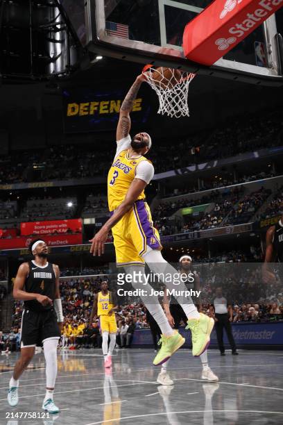 Anthony Davis of the Los Angeles Lakers dunks the ball during the game against the Memphis Grizzlies on April 12, 2024 at FedExForum in Memphis,...