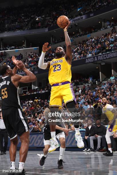 LeBron James of the Los Angeles Lakers drives to the basket during the game against the Memphis Grizzlies on April 12, 2024 at FedExForum in Memphis,...