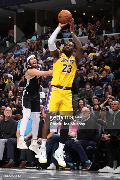 LeBron James of the Los Angeles Lakers shoots the ball during the game against the Memphis Grizzlies on April 12, 2024 at FedExForum in Memphis,...