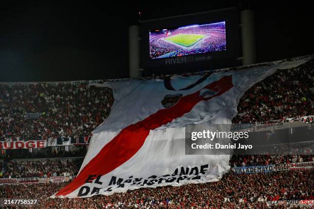 Fans of River Plate cheer before a Copa CONMEBOL Libertadores 2024 Group H match between River Plate and Nacional at Estadio Mas Monumental Antonio...