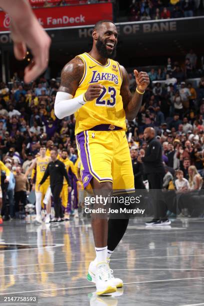 LeBron James of the Los Angeles Lakers smiles during the game against the Memphis Grizzlies on April 12, 2024 at FedExForum in Memphis, Tennessee....