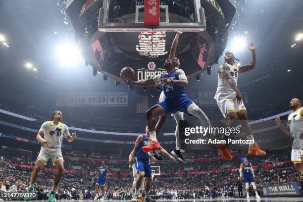 Norman Powell of the LA Clippers drives to the basket during the game against the Utah Jazz on April 12, 2024 at Crypto.Com Arena in Los Angeles,...