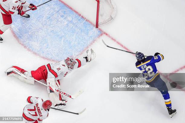 Frederik Andersen of the Carolina Hurricanes defends the net against Zach Dean of the St. Louis Blues on April 12, 2024 at the Enterprise Center in...