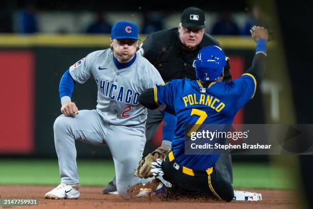 Second baseman Ben Brown of the Chicago Cubs tags out Jorge Polanco of the Seattle Mariners trying to steal second base during the fifth inning of a...