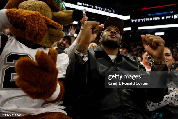 Dallas Cowboys Macah Parsons in attendance at the San Antonio Spurs game against the Denver Nuggets in the first half at Frost Bank Center on April...