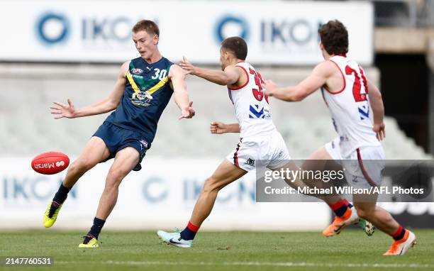 Luke Trainor of the AFL Academy in action during the 2024 AFL Academy match between the Marsh AFL National Academy Boys and Coburg Lions at Ikon Park...