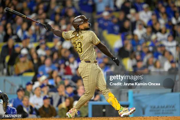 Fernando Tatis Jr. #23 of the San Diego Padres hits a two run home run in the seventh inning against the Los Angeles Dodgers at Dodger Stadium on...