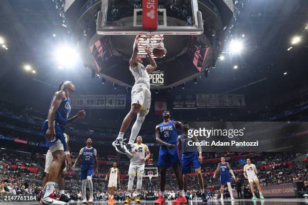 Darius Bazley of the Utah Jazz dunks the ball during the game against the LA Clippers on April 12, 2024 at Crypto.Com Arena in Los Angeles,...