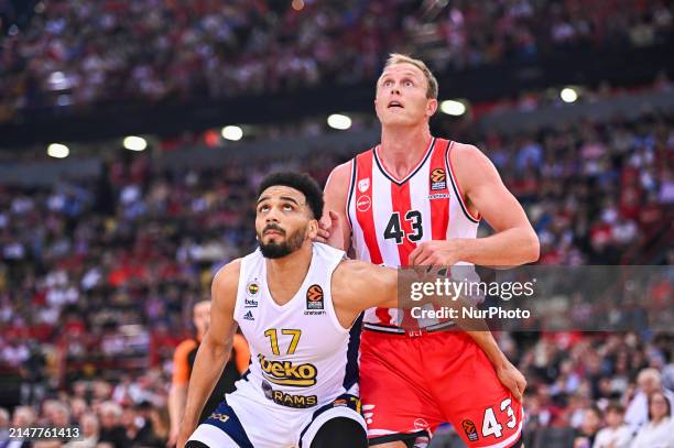 Amine Noua, number 17 from Fenerbahce Beko Istanbul, is competing with Luke Sikma, number 43 of Olympiacos Piraeus, during the Euroleague Round 34...