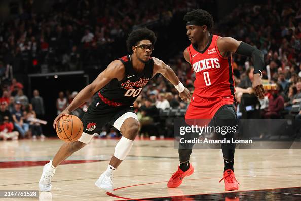 Scood Rockets Scoot Henderson of the Portland Trail Blazers drives to the basket as ...