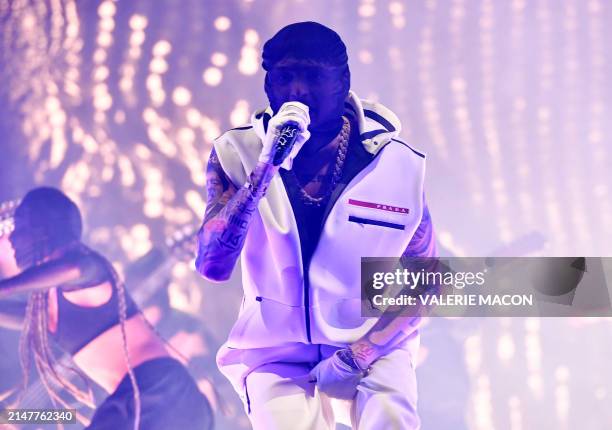 Mexican singer Peso Pluma performs on the Coachella Stage during the Coachella Valley Music and Arts Festival in Indio, California, on April 12, 2024.