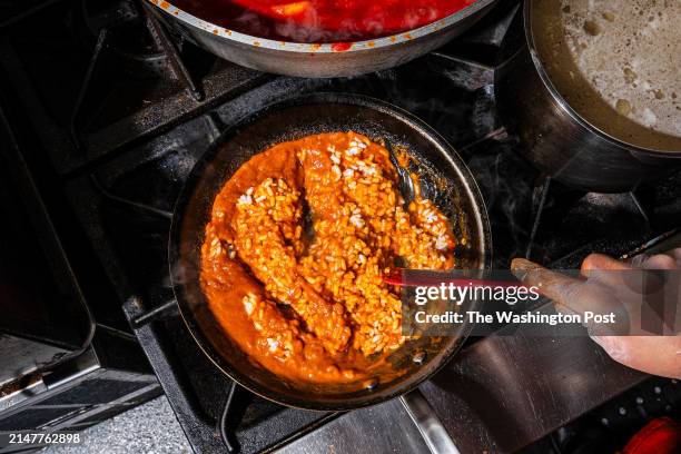 Cooking Jollof Risotto from Almeda in Washington, DC on January 20, 2024