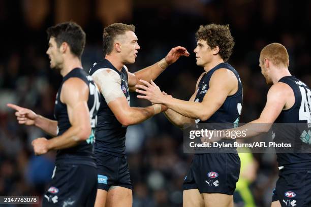 Charlie Curnow of the Blues celebrates a goal with Patrick Cripps of the Blues during the 2024 AFL Round 05 match between the Carlton Blues and the...