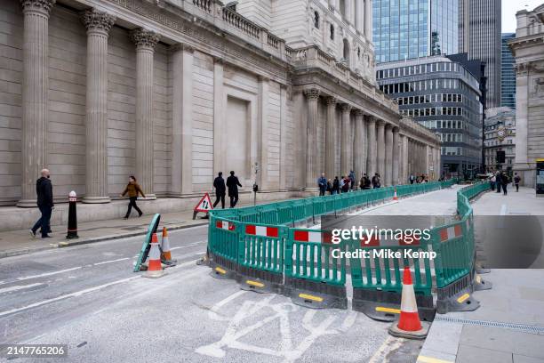 Street works to widen pavements and create more space for pedestrians underway outside Bank of England in the City of London on 8th April 2024 in...