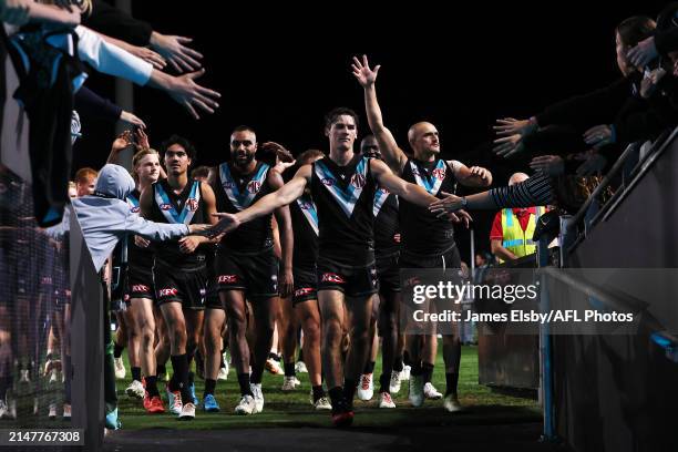 Connor Rozee of the Power celebrates their win during the 2024 AFL Round 05 match between the Port Adelaide Power and the Fremantle Dockers at...