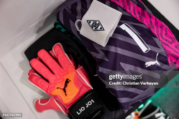 The shorts, goalkeeper gloves and captains armband of Jonas Omlin inside the dressing room of Borussia Moenchengladbach ahead of the Bundesliga match...