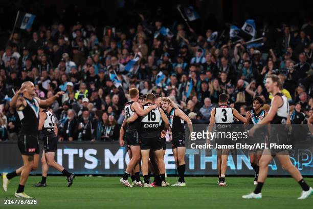 The Power celebrate their win during the 2024 AFL Round 05 match between the Port Adelaide Power and the Fremantle Dockers at Adelaide Oval on April...