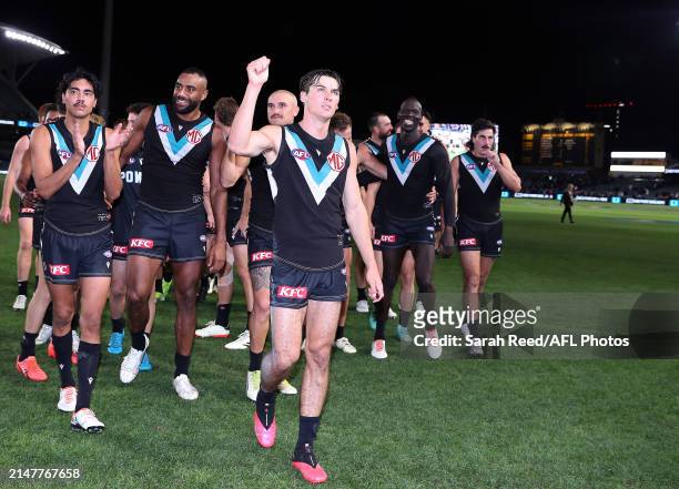 Connor Rozee of the Power leads his team off after the win during the 2024 AFL Round 05 match between the Port Adelaide Power and the Fremantle...