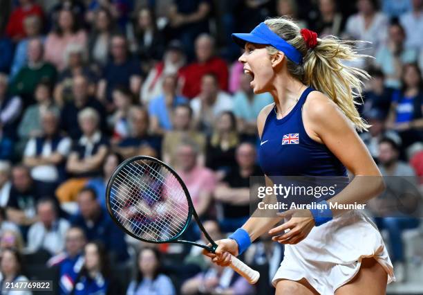 Katie Boulter of Great Britain celebrates after winning against Clara Burel of France during the Billie Jean King Cup Qualifier match between France...