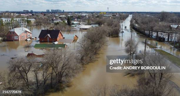 An aerial view shows the flood-hit city of Orenburg on April 13, 2024. Russian emergency services on April 13, 2024 said they had evacuated thousands...
