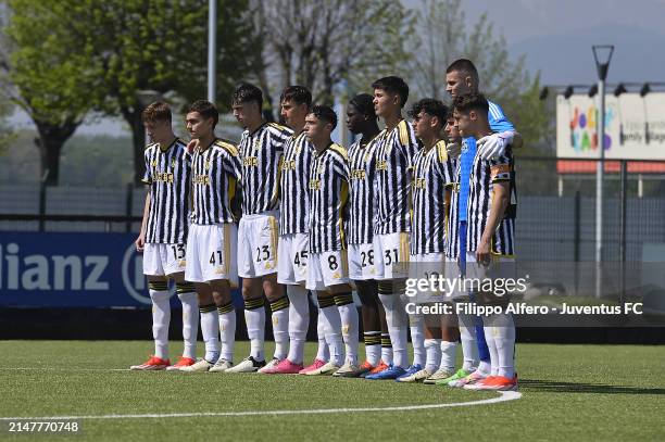 Juventus players observe a minute's silence during the Primavera 1 match between Juventus U19 and AS Roma U19 at Juventus Center Vinovo on April 13,...