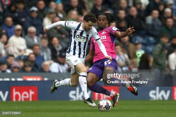 Mikey Johnston of West Bromwich Albion and Pierre Ekwah of Sunderland during the Sky Bet Championship match between West Bromwich Albion and...