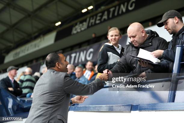 Shilen Patel Chairman and owner of West Bromwich Albion signs some autographs for West Bromwich Albion after making a pitch side presentation ahead...