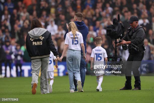 Stuart Dallas is walking the pitch with his family at halftime during the SkyBet Championship match between Leeds United and Blackburn Rovers at...