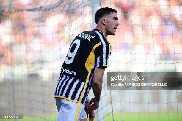 Juventus' Serbian forward Dusan Vlahovic reacts during the Italian Serie A football match between Torino and Juventus at the Grande Torino Stadium in...