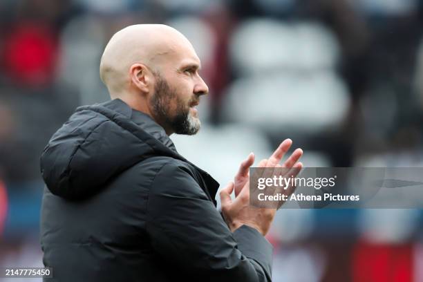 Swansea City manager Luke Williams applauds home supporters after the Sky Bet Championship match between Swansea City and Rotherham United at the...