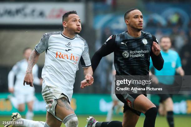 Ronald of Swansea City and Cohen Bramall of Rotherham United in action during the Sky Bet Championship match between Swansea City and Rotherham...