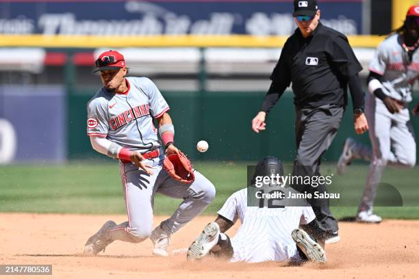 Kevin Pillar of the Chicago White Sox steals second base as Santiago Espinal of the Cincinnati Reds mishandles the throw in the fourth inning at...