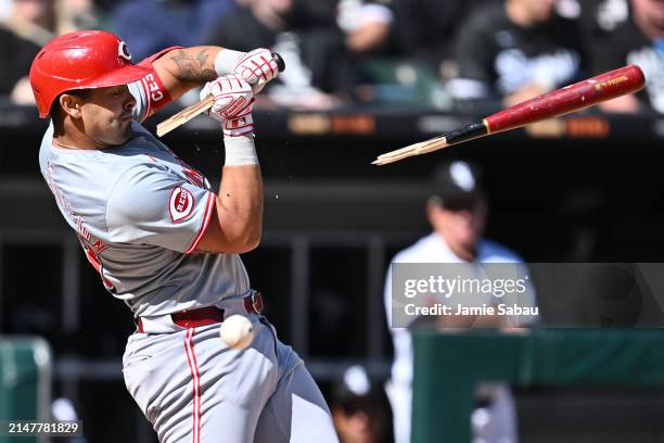 Christian Encarnacion-Strand of the Cincinnati Reds breaks his bat in the eighth inning against the Chicago White Sox at Guaranteed Rate Field on...