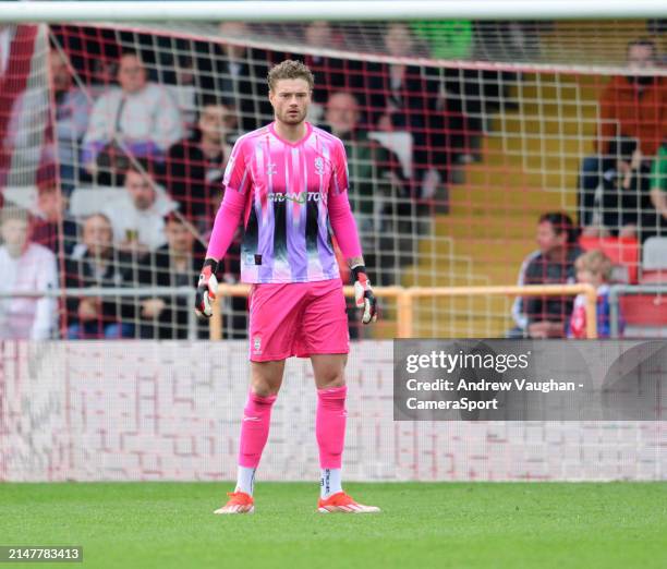 Lincoln City's Lukas Jensen during the Sky Bet League One match between Lincoln City and Wigan Athletic at LNER Stadium on April 13, 2024 in Lincoln,...