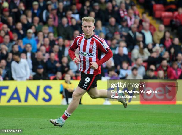 Lincoln City's Joe Taylor during the Sky Bet League One match between Lincoln City and Wigan Athletic at LNER Stadium on April 13, 2024 in Lincoln,...