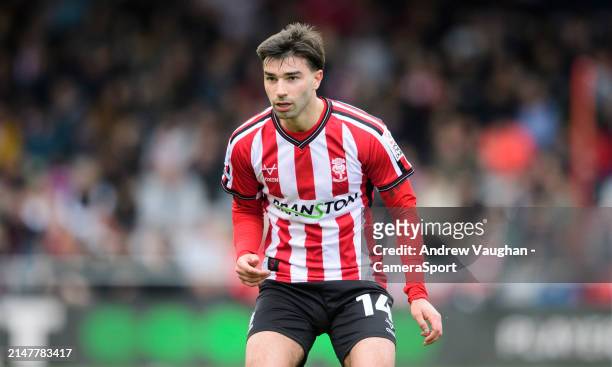 Lincoln City's Danny Mandroiu during the Sky Bet League One match between Lincoln City and Wigan Athletic at LNER Stadium on April 13, 2024 in...