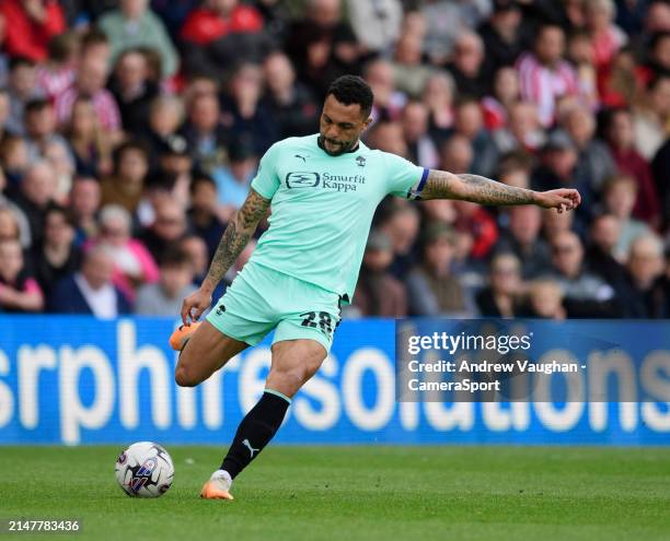 Wigan Athletic's Josh Magennis during the Sky Bet League One match between Lincoln City and Wigan Athletic at LNER Stadium on April 13, 2024 in...