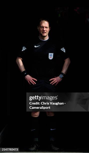 Referee Martin Coy waits in the tunnel prior to the Sky Bet League One match between Lincoln City and Wigan Athletic at LNER Stadium on April 13,...