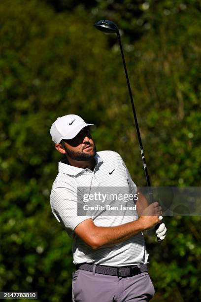 Scottie Scheffler hits his tee shot on the 11th hole during the third round of Masters Tournament at Augusta National Golf Club on April 13, 2024 in...