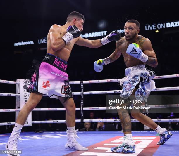 Jordan Gill and Zelfa Barrett during their WBA International Super Featherweight Title Contest at AO Arena on April 13, 2024 in Manchester, England.