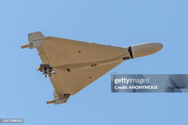 Iranian-made Shahed-136 'Kamikaze' drone flies over the sky of Kermanshah, Iran on March 7, 2024. Iran fired over 100 drones and ballistic missiles...