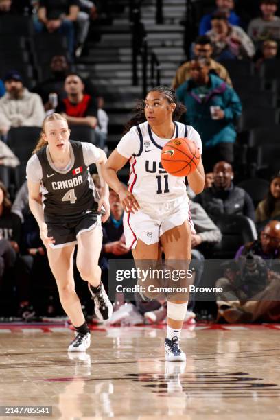 Kennedy Smith of Team USA dribbles the ball during the game against Team World during the 2024 Nike Hoop Summit on April 13, 2024 at the Moda Center...