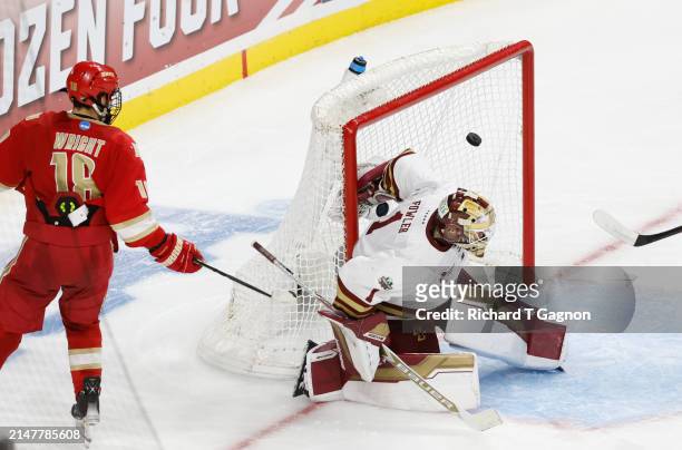 Jared Wright of the Denver Pioneers scores against Jacob Fowler of the Boston College Eagles in the second period during the NCAA Men's Hockey Frozen...
