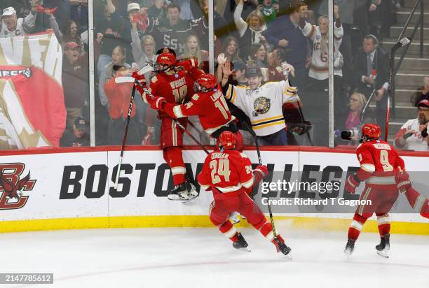 Jared Wright of the Denver Pioneers celebrates his goal against the Boston College Eagles in the second period during the NCAA Men's Hockey Frozen...