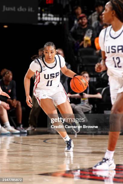 Kennedy Smith of Team USA dribbles the ball during the game against Team World during the 2024 Nike Hoop Summit on April 13, 2024 at the Moda Center...